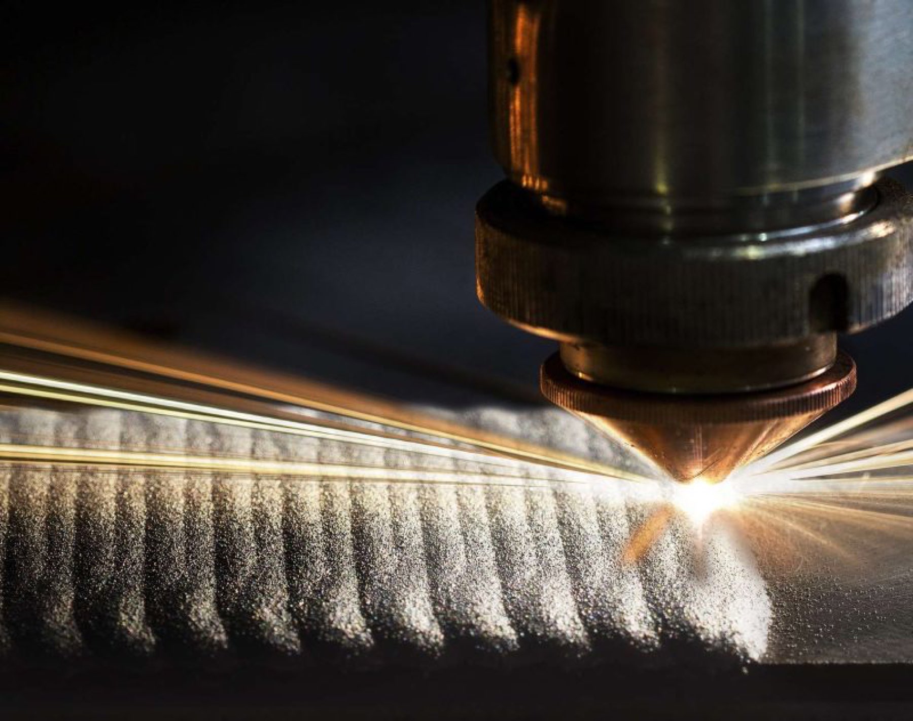 Laser cladding — powder stream and bead tracks